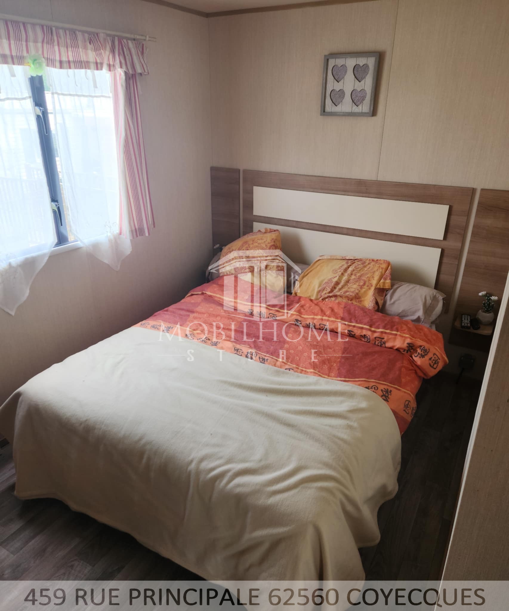 Photo de la chambre parentale avec un lit double du mobil-home ABI TEBAY