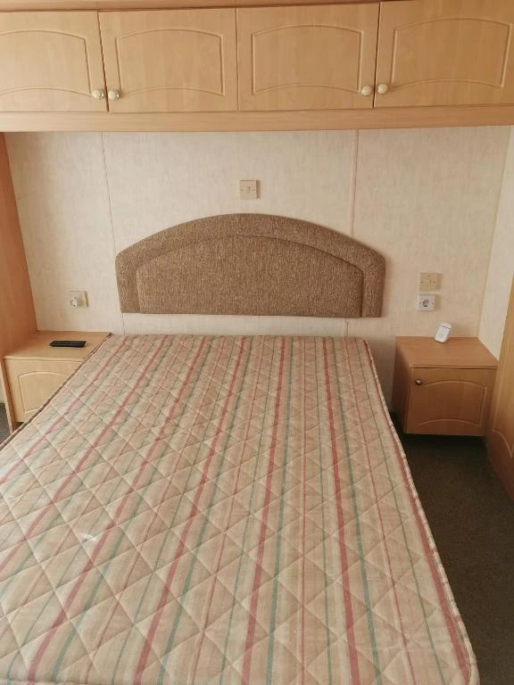 Photo de la chambre parentale avec un lit double du mobil-home Foulque