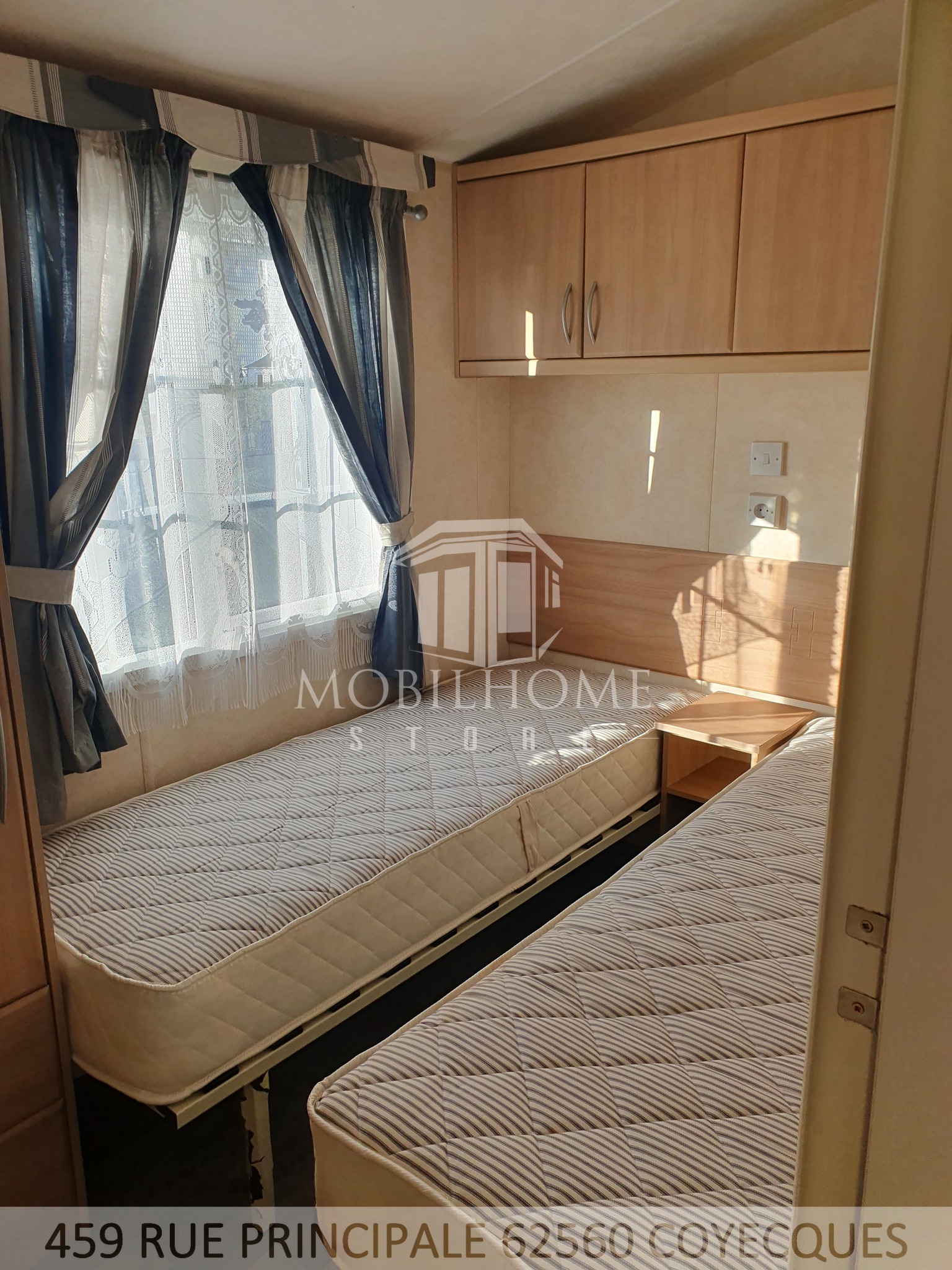 Photo de la deuxième chambre avec deux lits simple du mobil-home BK BLUEBIRD SHERATON