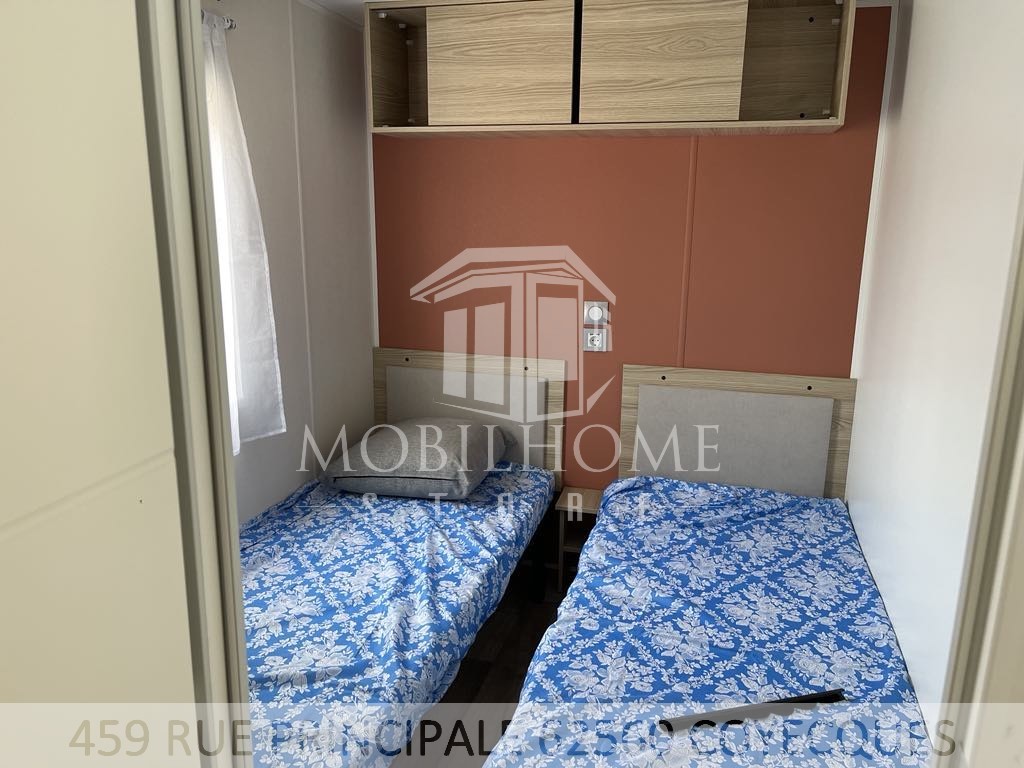 Photo de la deuxième chambre avec deux lits simple du mobil-home TRIGANO EXPRESSION