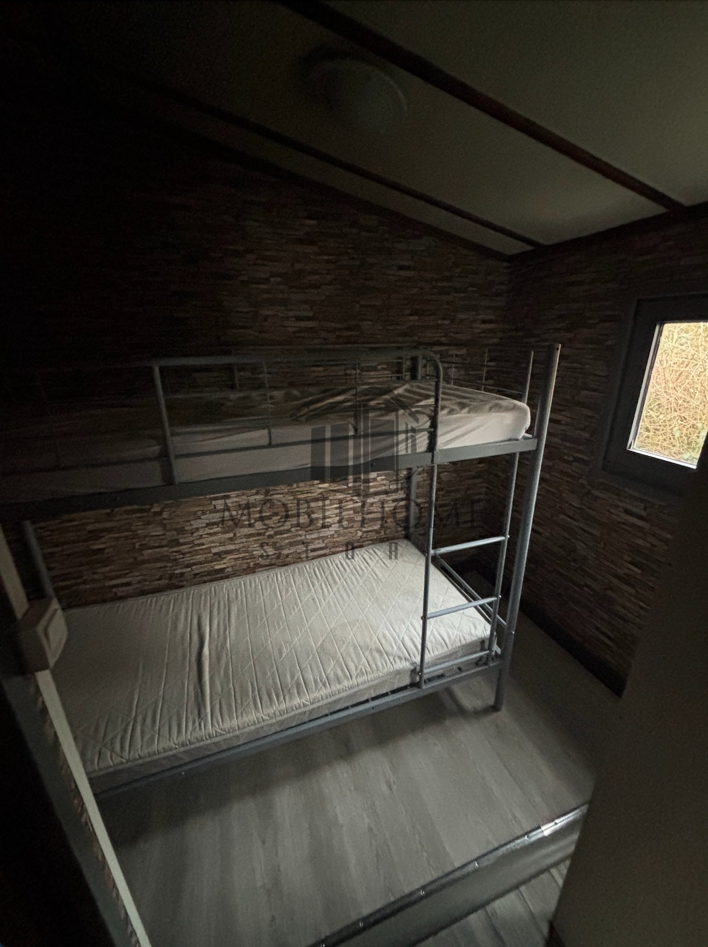 Deuxième chambre avec un lit simple superposé du mobil-home CHALET sur emplacement au camping de La Tentation