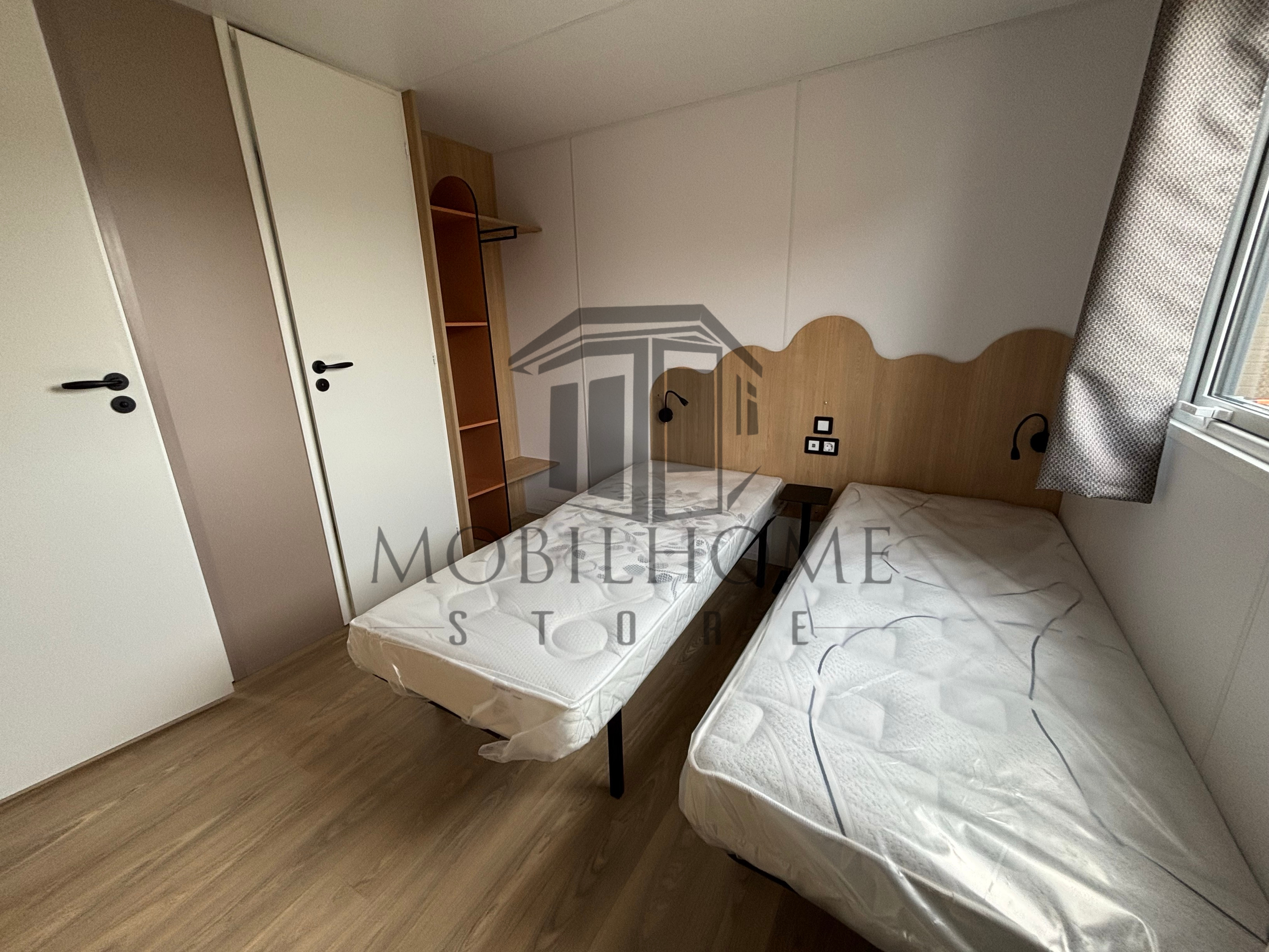 Deuxième chambre avec deux lits simples du mobil-home LOUISIANE IROISE