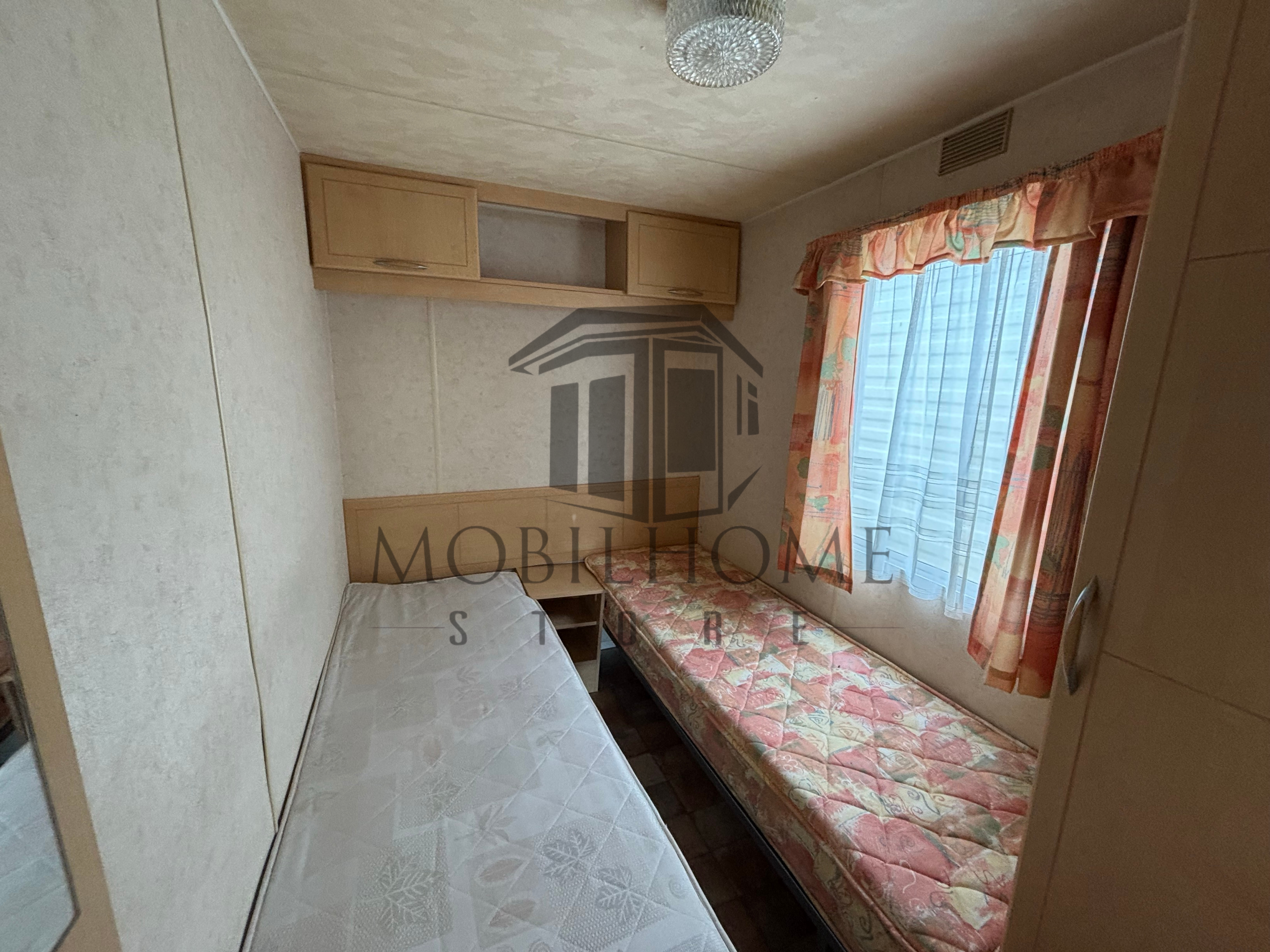 Deuxième chambre avec deux lits simples du mobil-home Atlas Mirage