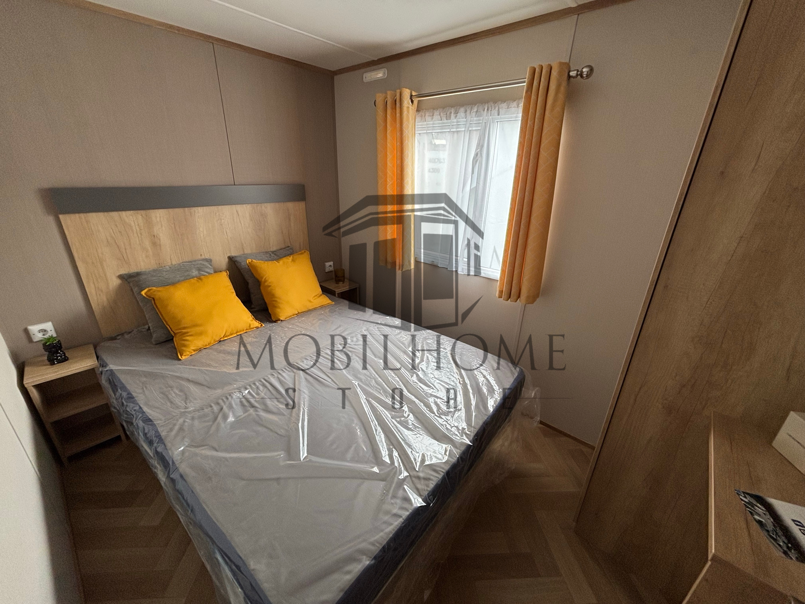 Chambre parentale avec un lit double du mobil-home CARNABY BREAKAWAY