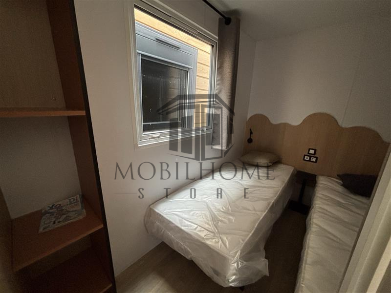 Troisième chambre avec deux lits simples du mobil-home LOUISIANE CARAÏBES