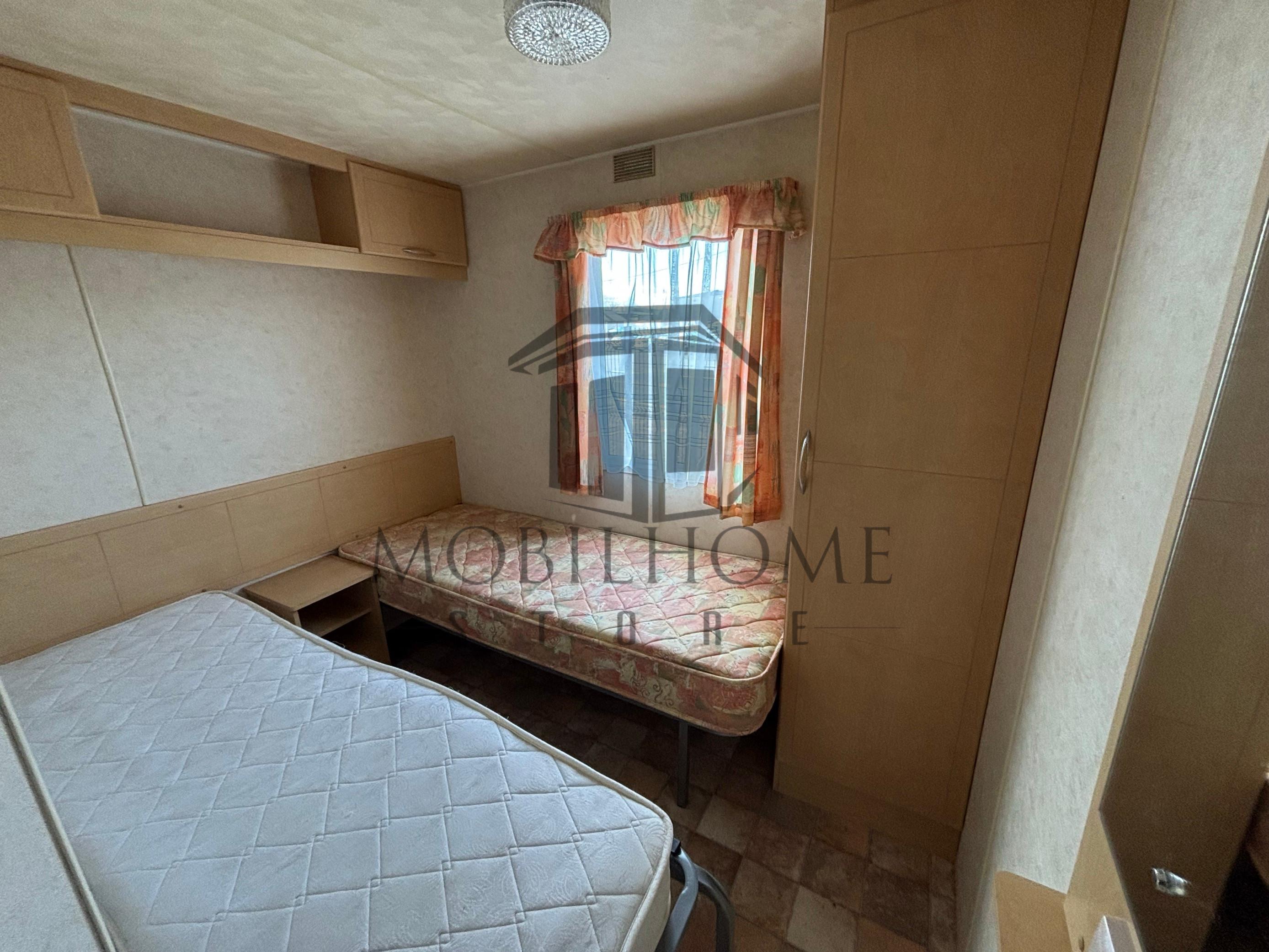 Troisième chambre avec deux lits simples du mobil-home Atlas Mirage