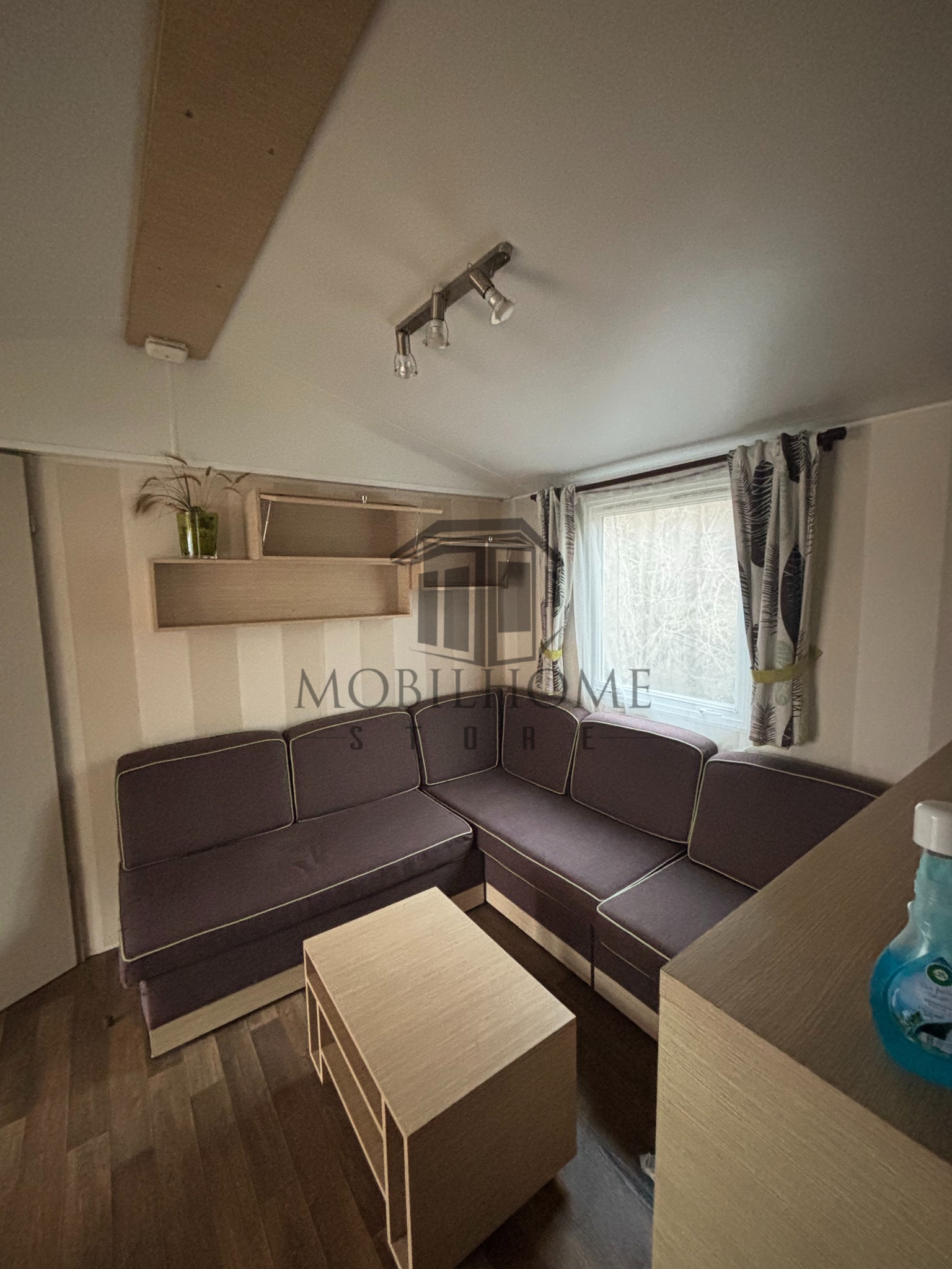 Salon du mobil-home IRM SUPER CELINA CONFORT AVANE sur emplacement au camping de La Tentation