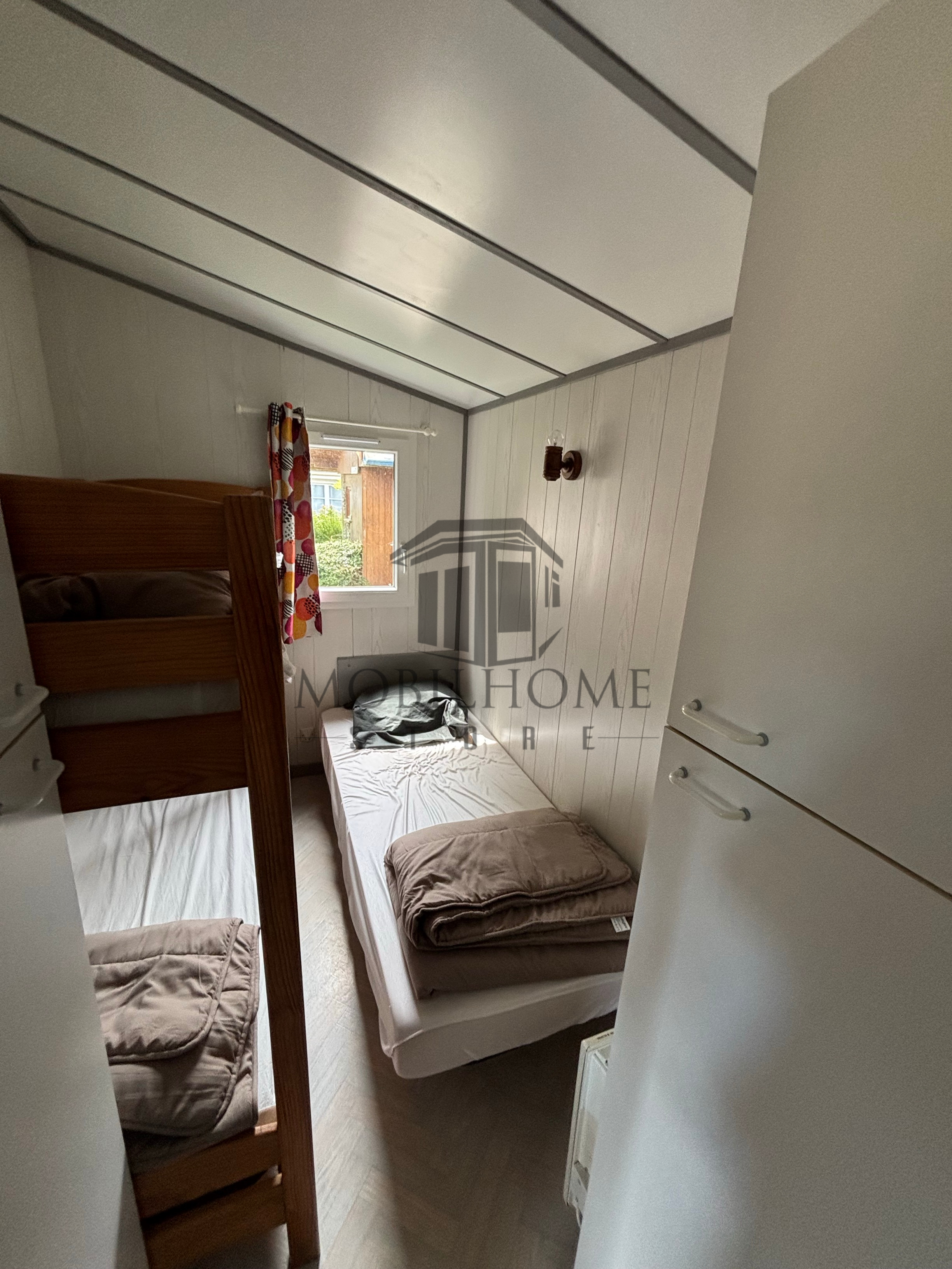 Deuxième chambre du mobil-home P26B