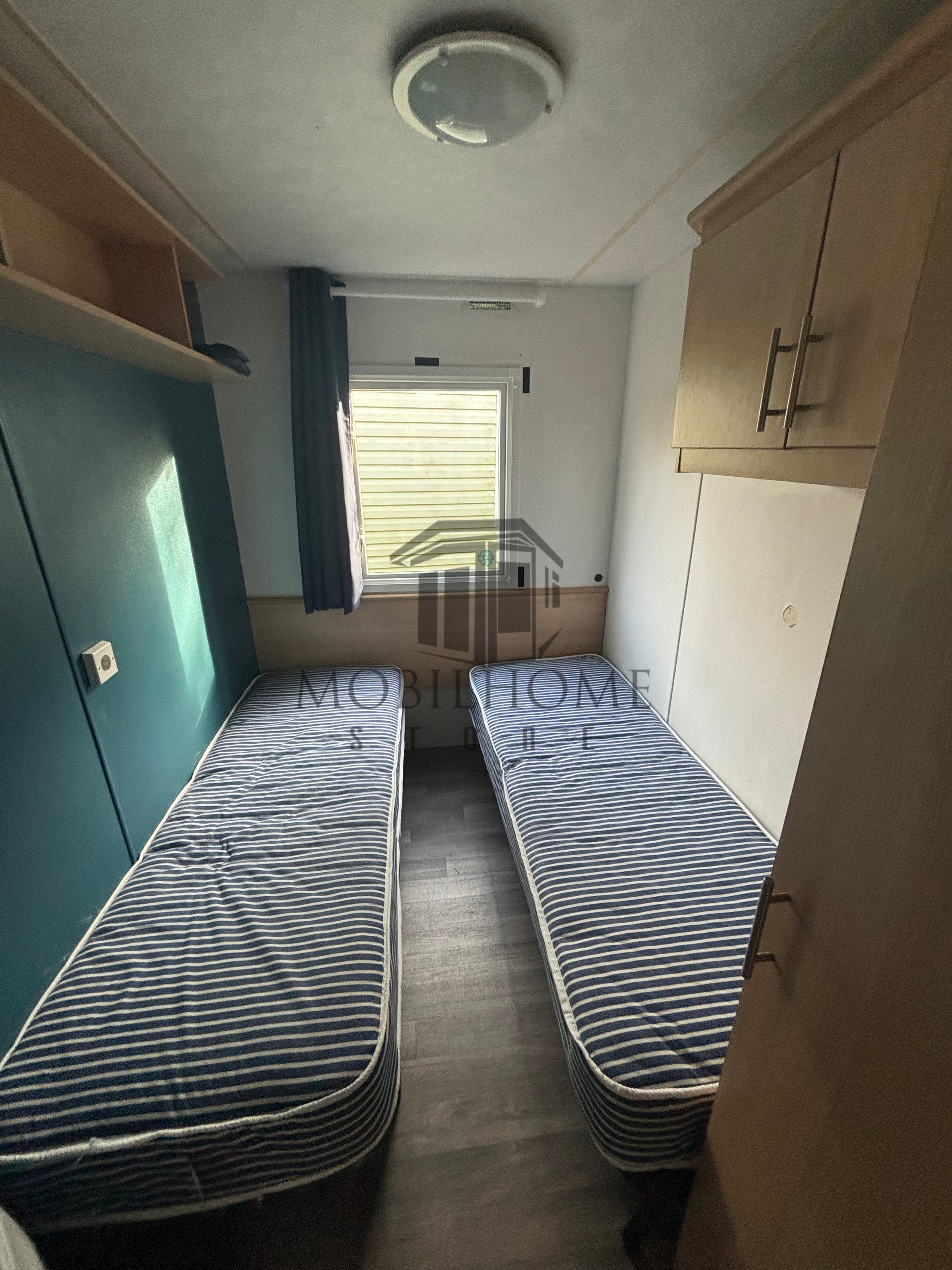 Deuxième chambre du mobil-home P4