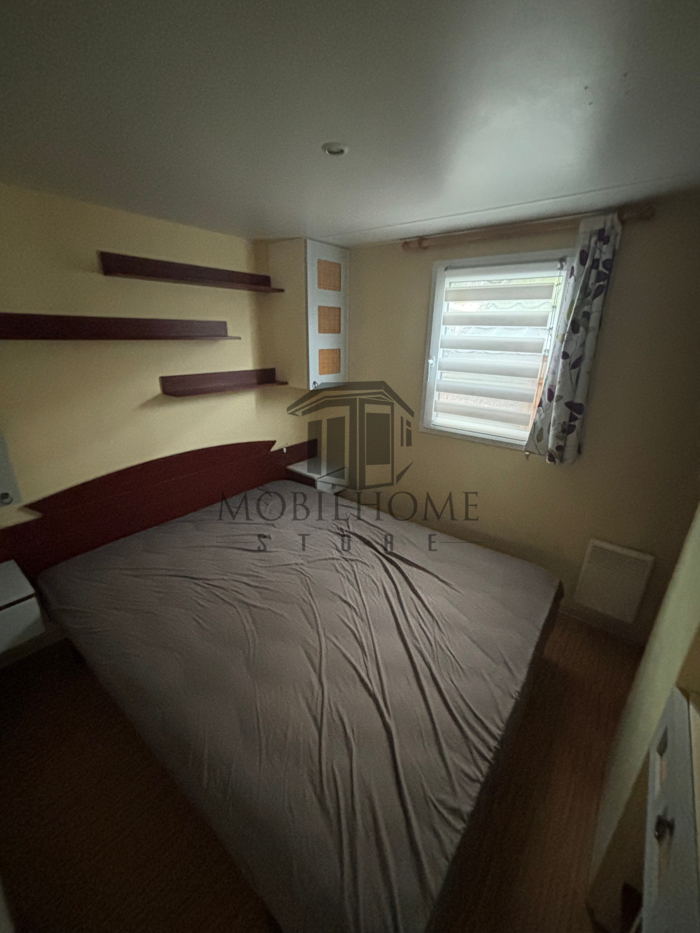Chambre parentale du mobil-home P31