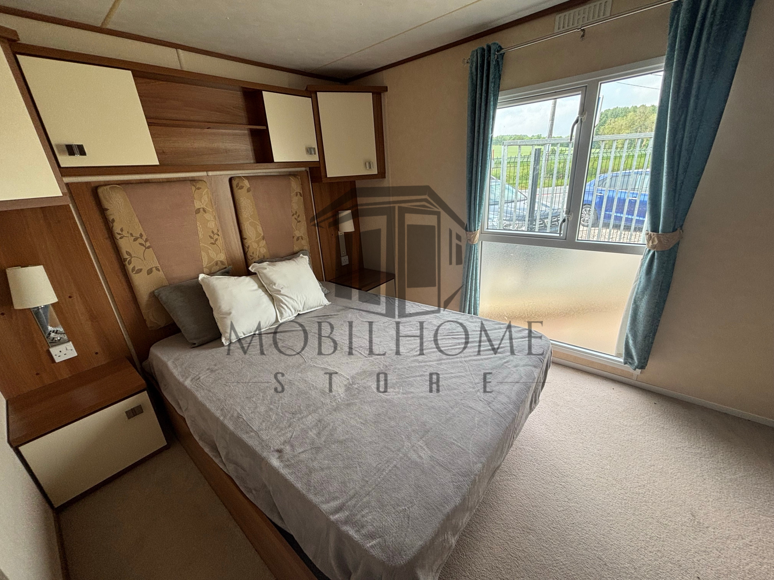 Chambre parentale du mobil-home ABI CONNOISSEUR