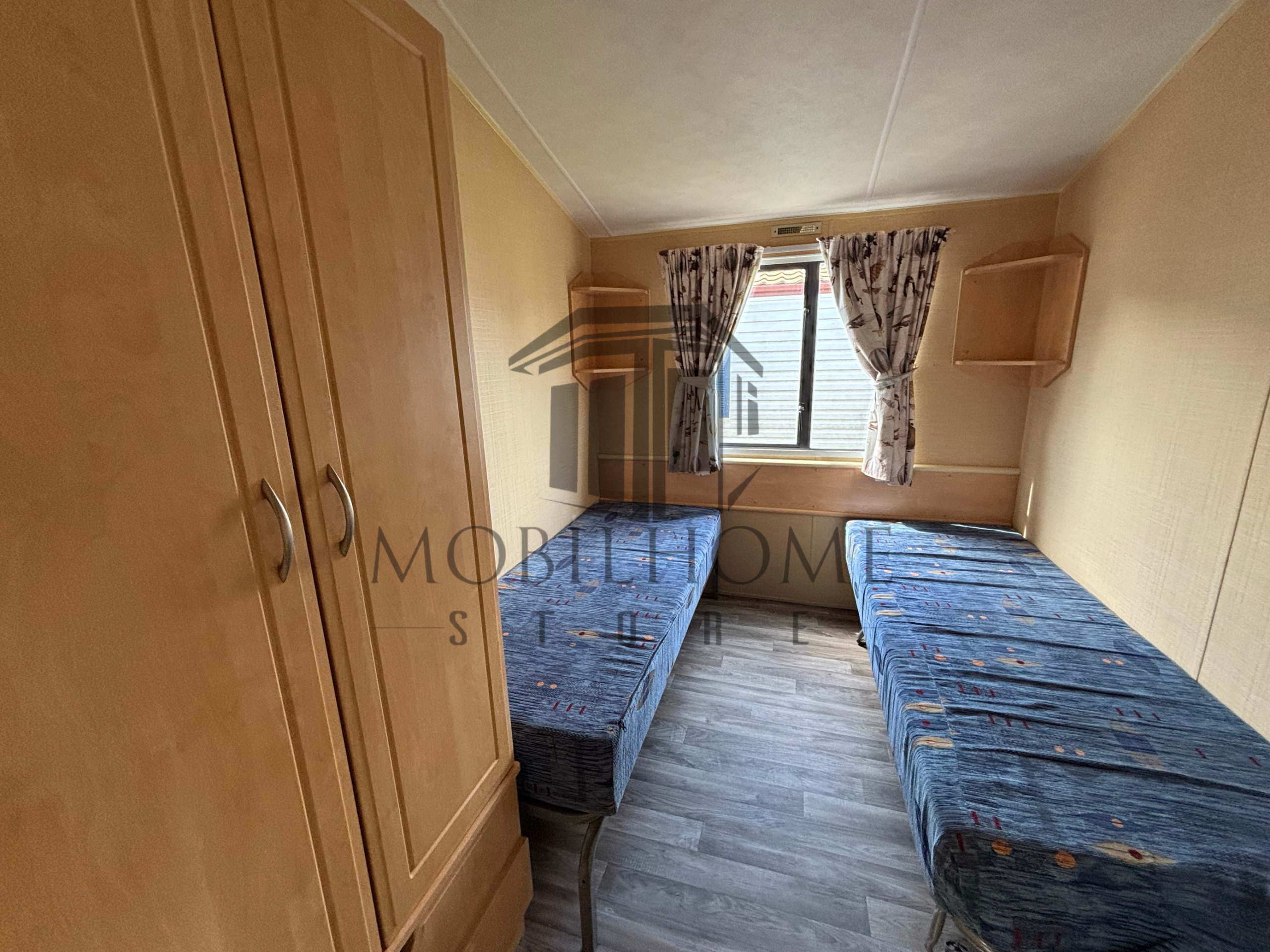 Deuxième chambre du mobil-home P74