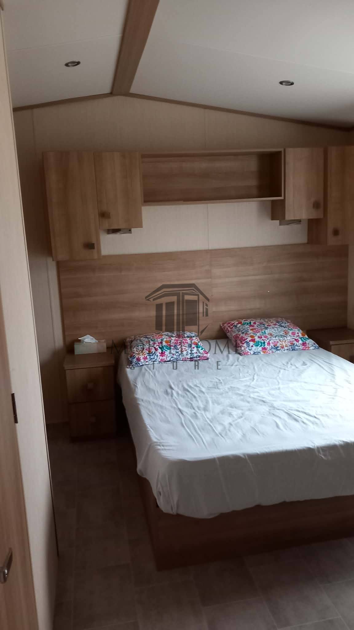 Chambre parentale du mobil-home ABI SUNNINGDALE vendu sur emplacement sur le camping de La Sensation
