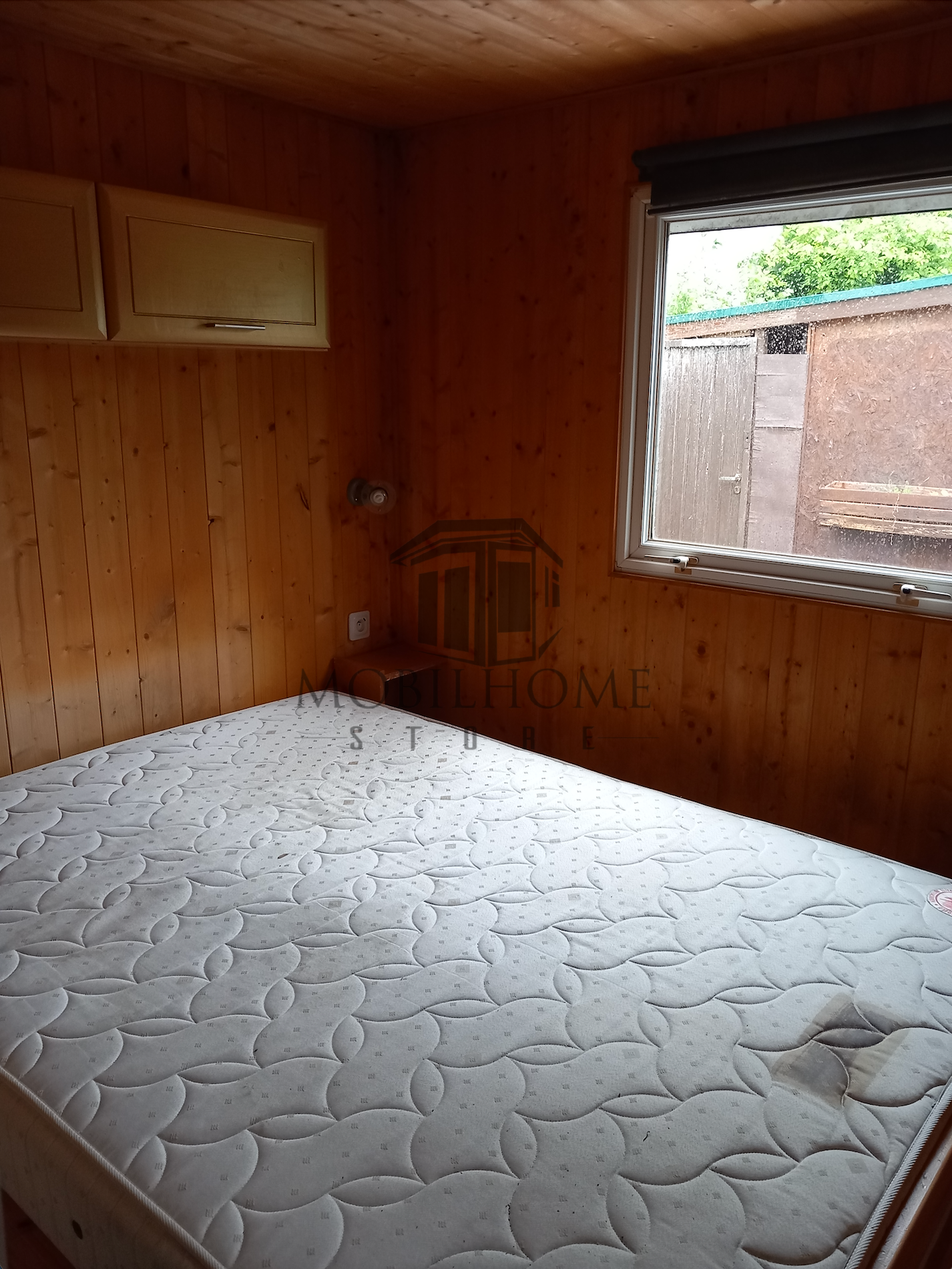 Chambre parentale du mobil-home IRM Constellation Confort vendu sur emplacement sur le camping de La Nouvelle Aventure