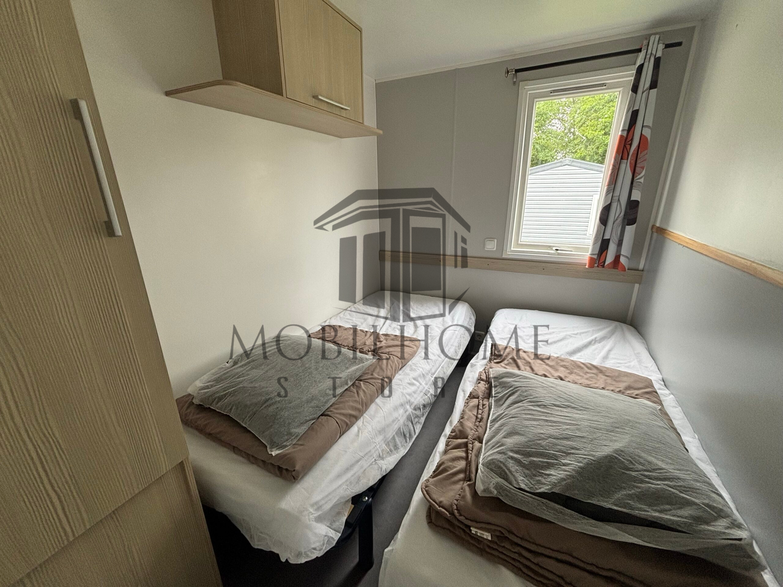 Deuxième chambre du mobil-home P25