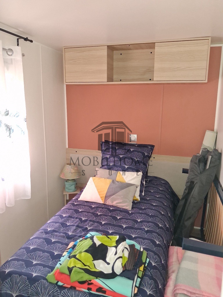 Chambre du mobil-home P83 au camping La Sensation