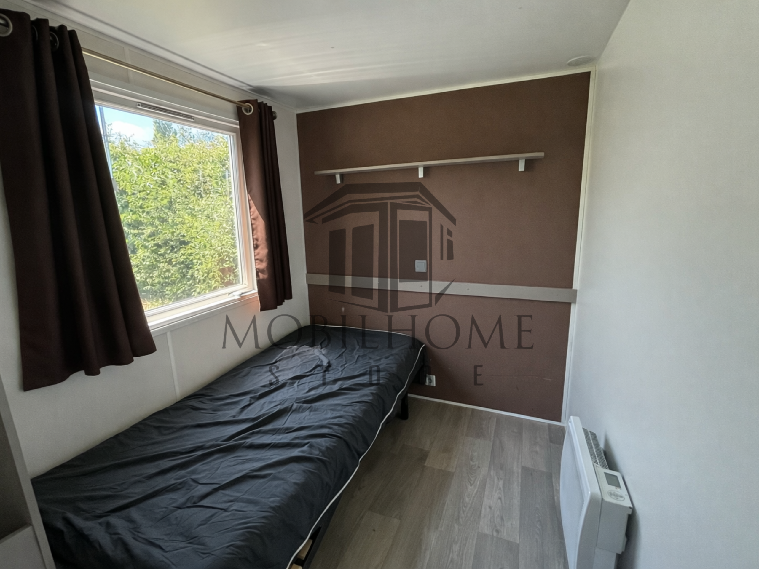 Chambre du mobil-home TRIGANO EVO 33
