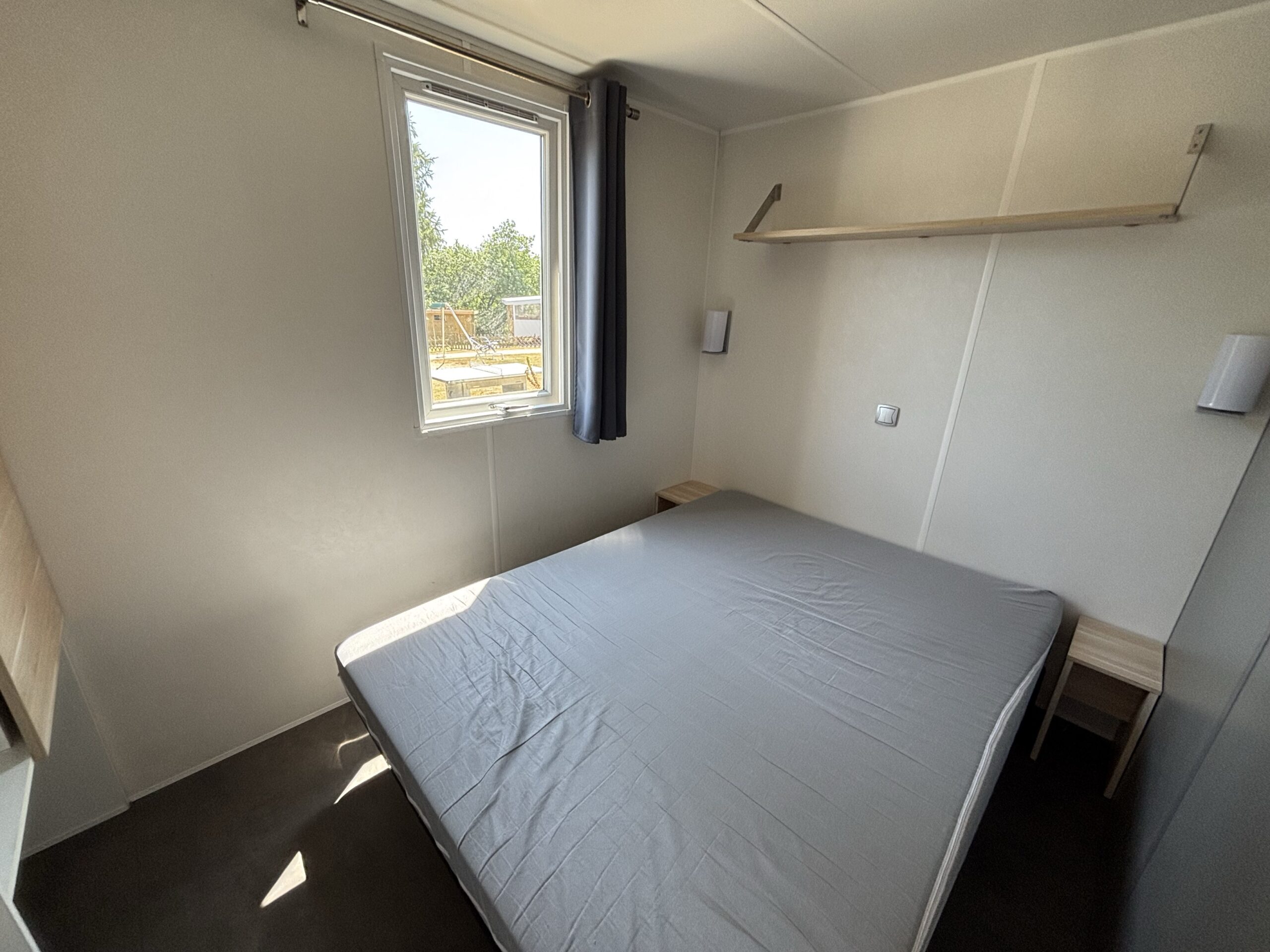 Chambre parentale du mobil-home Le Temp'o