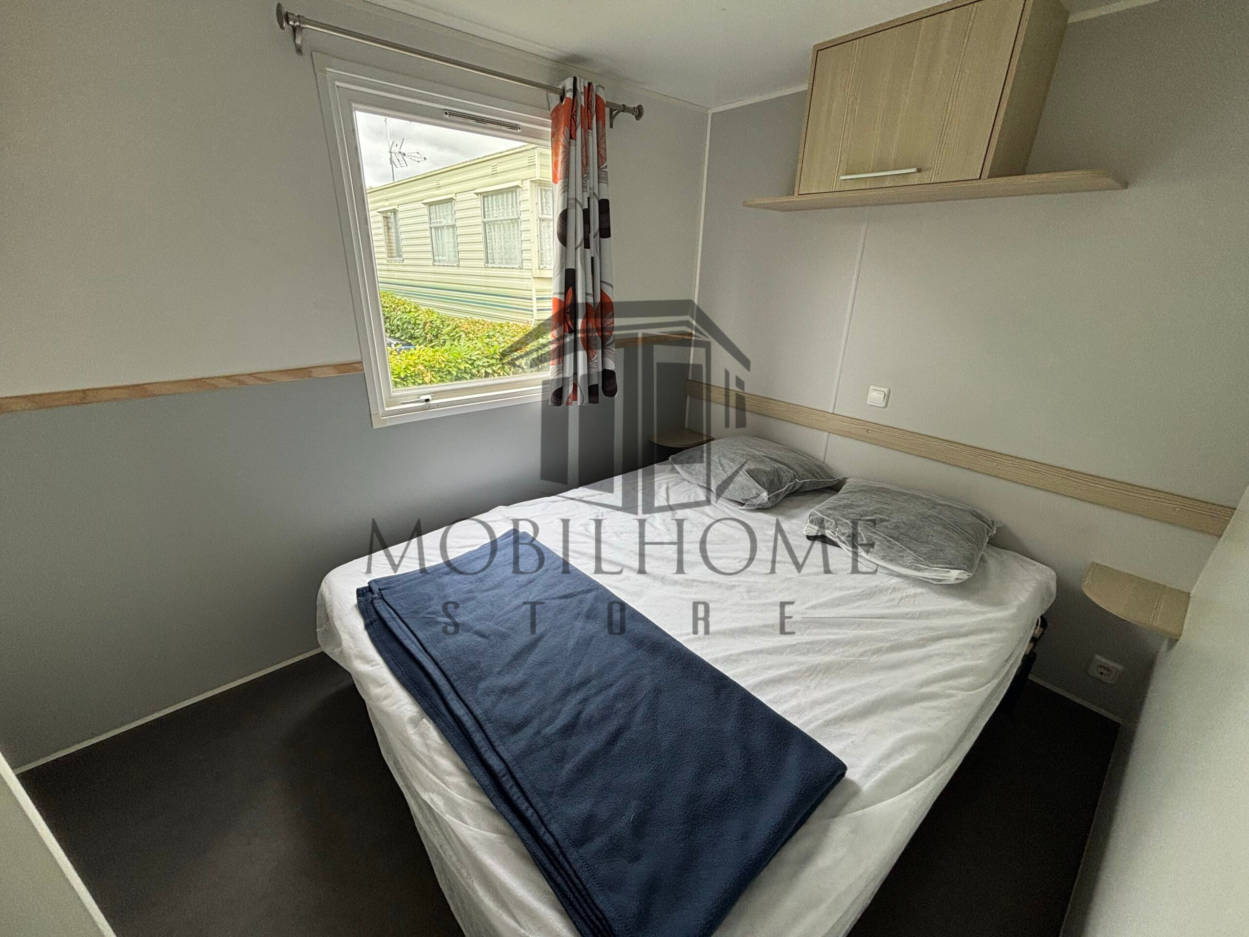 Chambre parentale du mobil-home P25