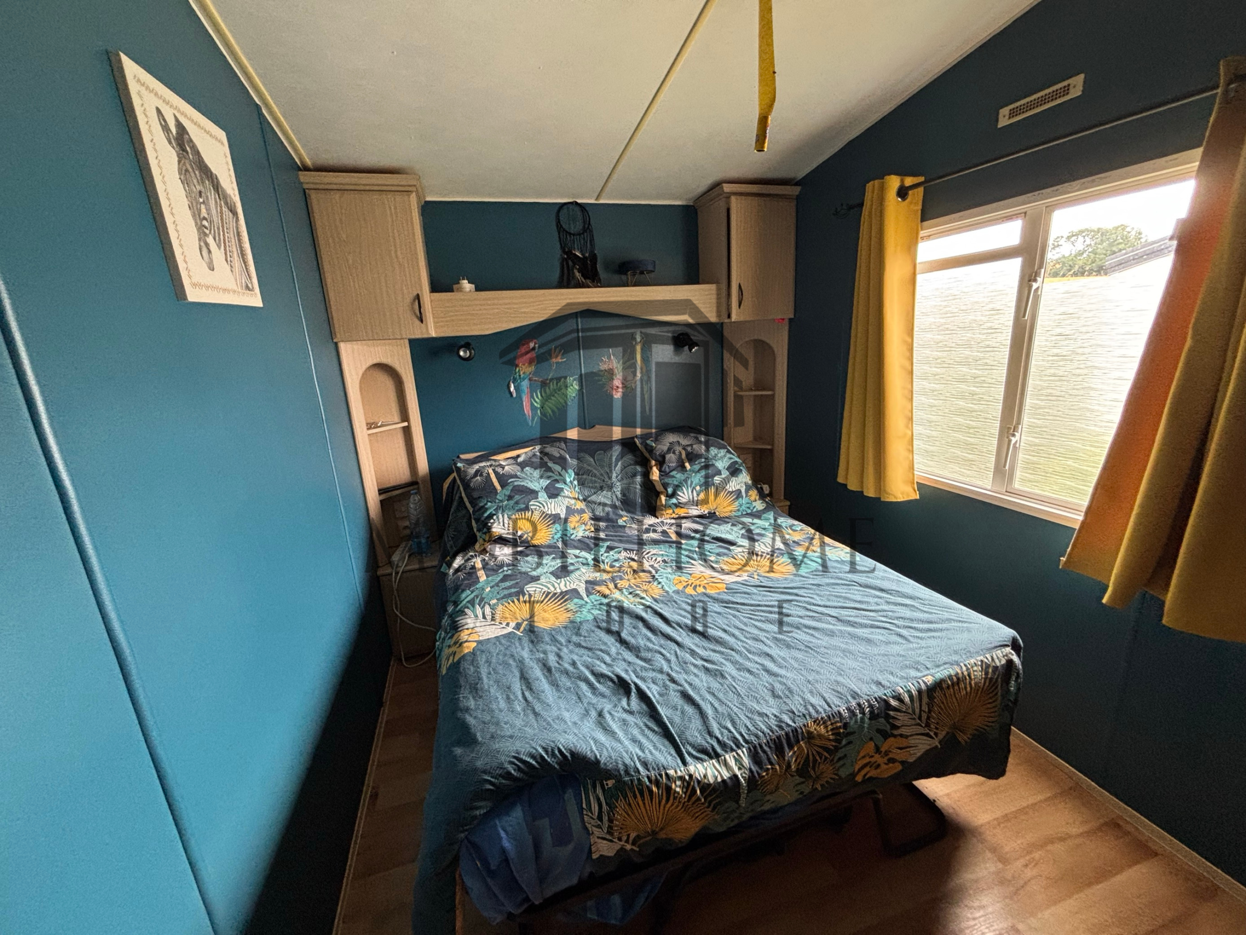 Chambre parentale du mobil-home P45 au camping de La Sensation