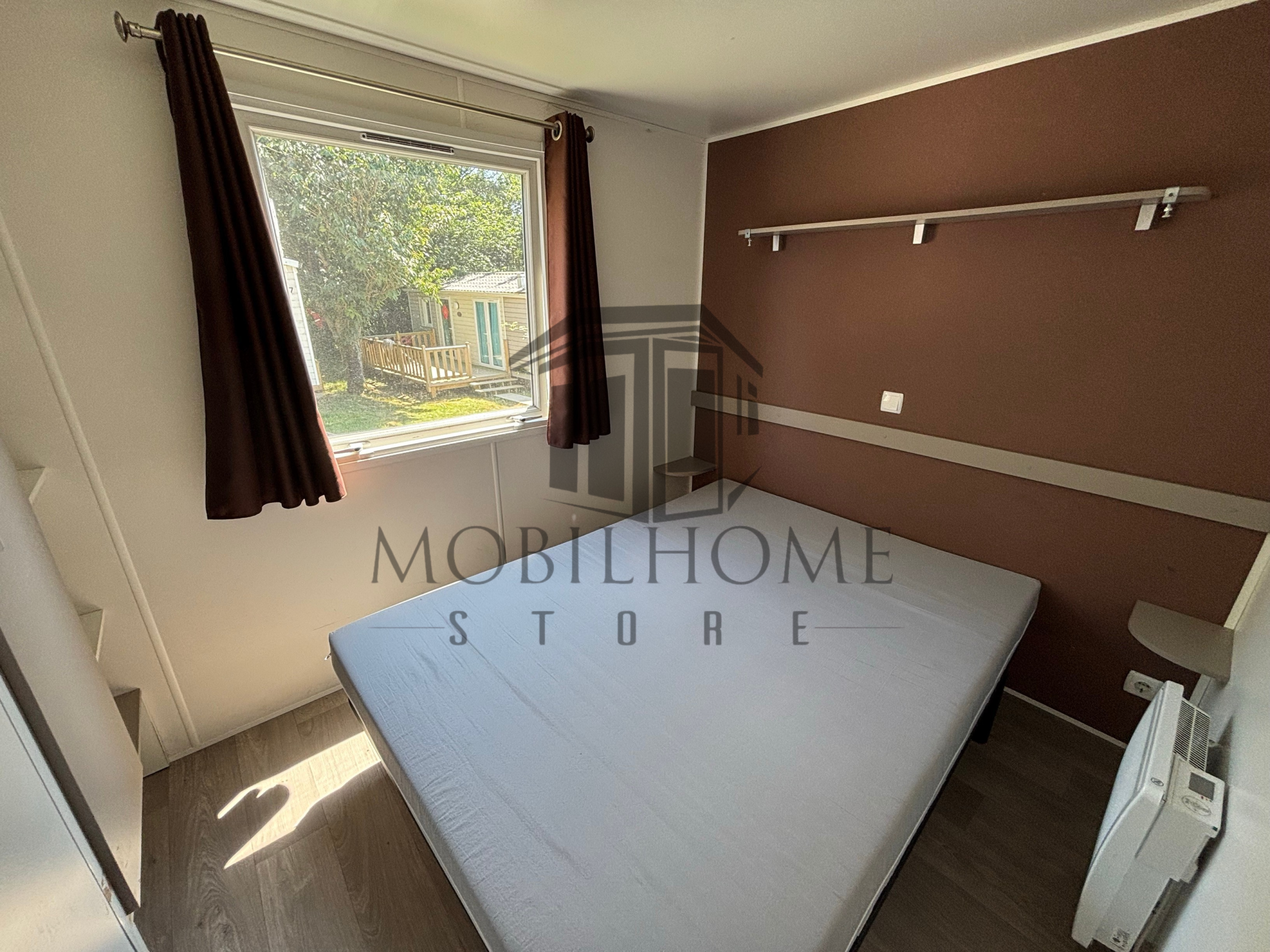 Chambre parentale du mobil-home TRIGANO EVO 33