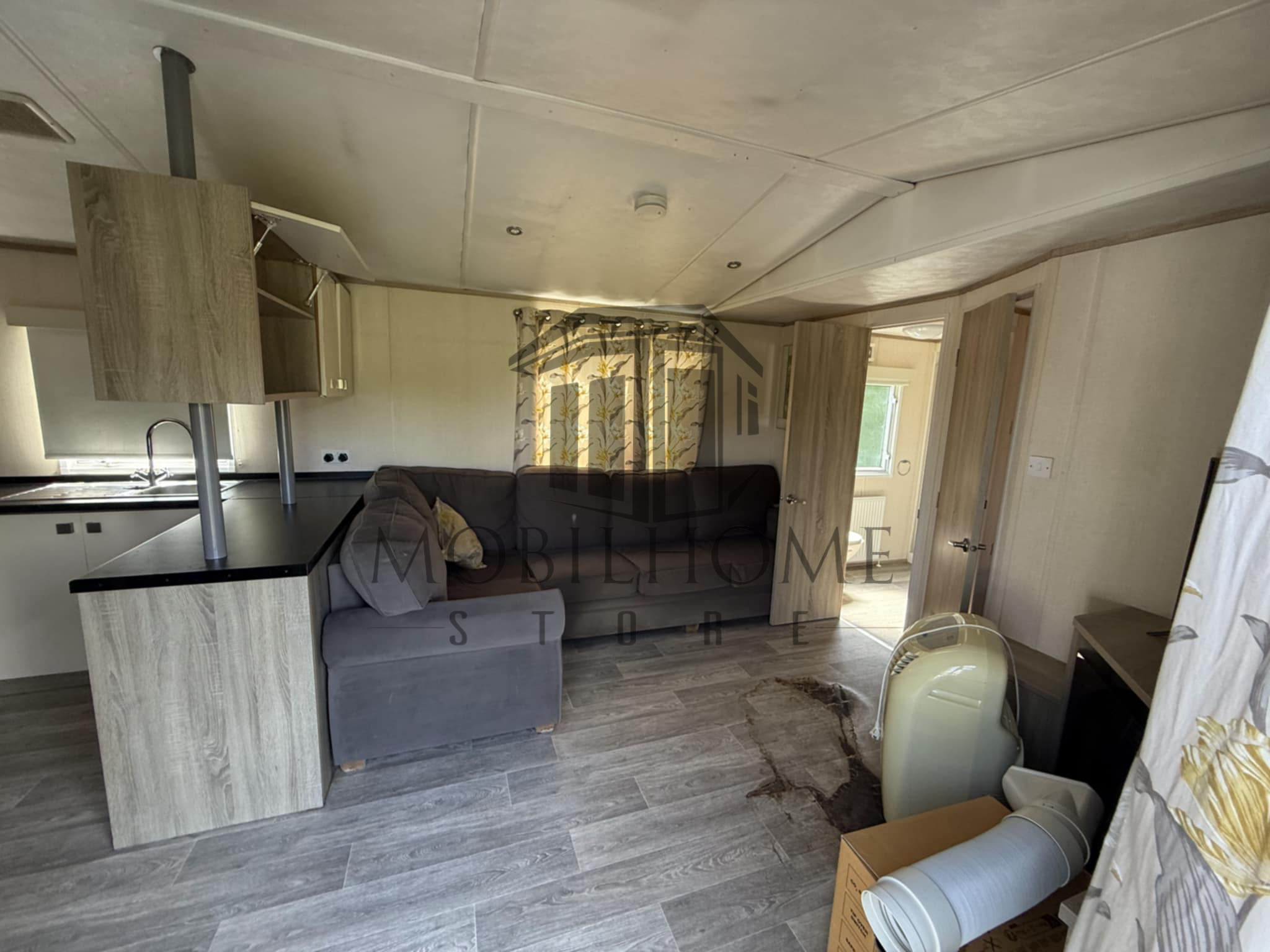 Salon du mobil-home P57 au camping La Nouvelle Aventure