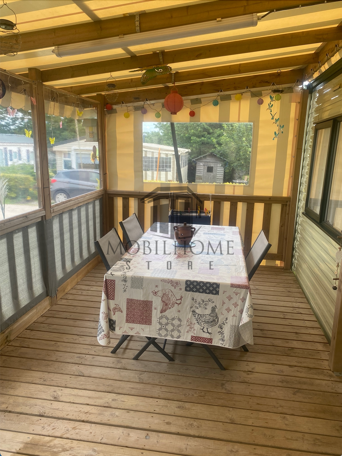 Terrasse du mobil-home P14 au camping La Nouvelle Aventure