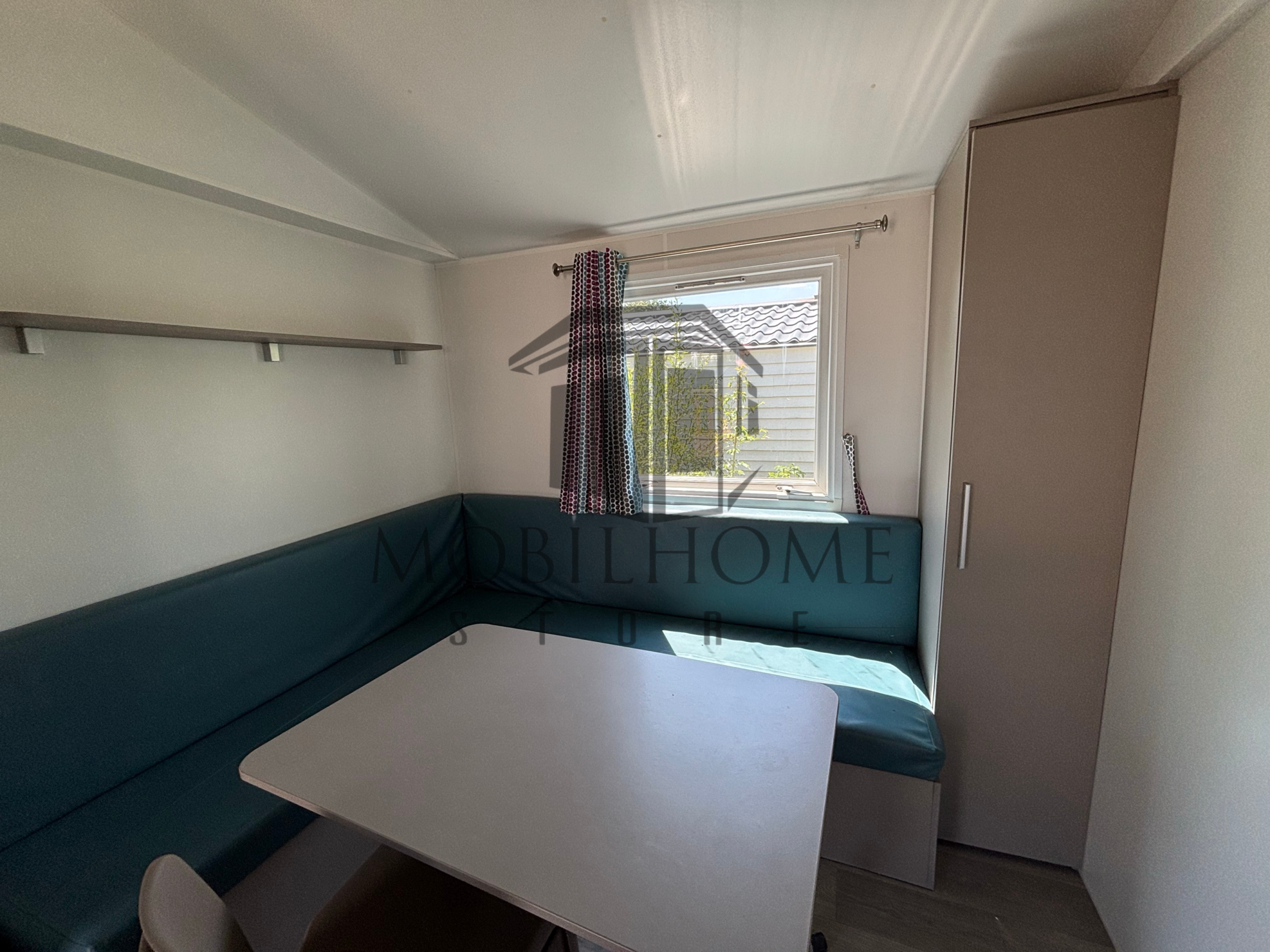 Coin repas du mobil-home TRIGANO EVO 31