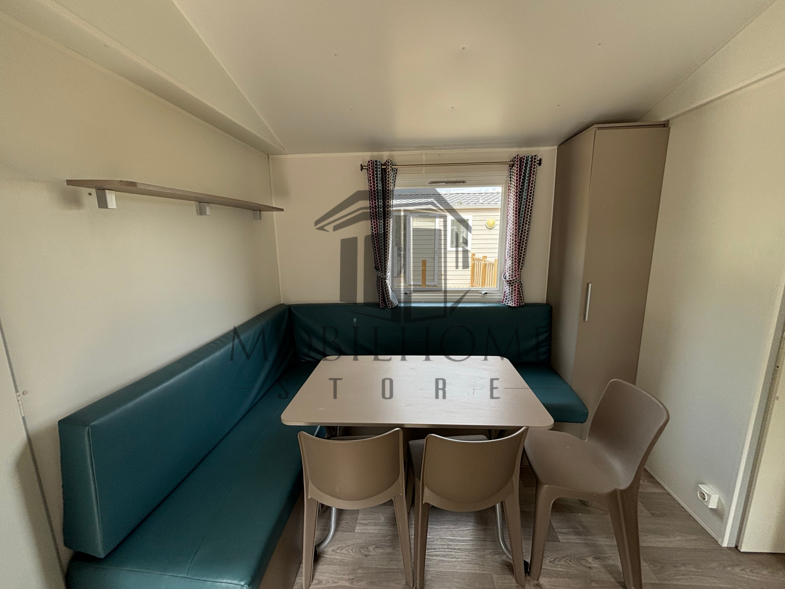 Coin repas du mobil-home TRIGANO EVO 31