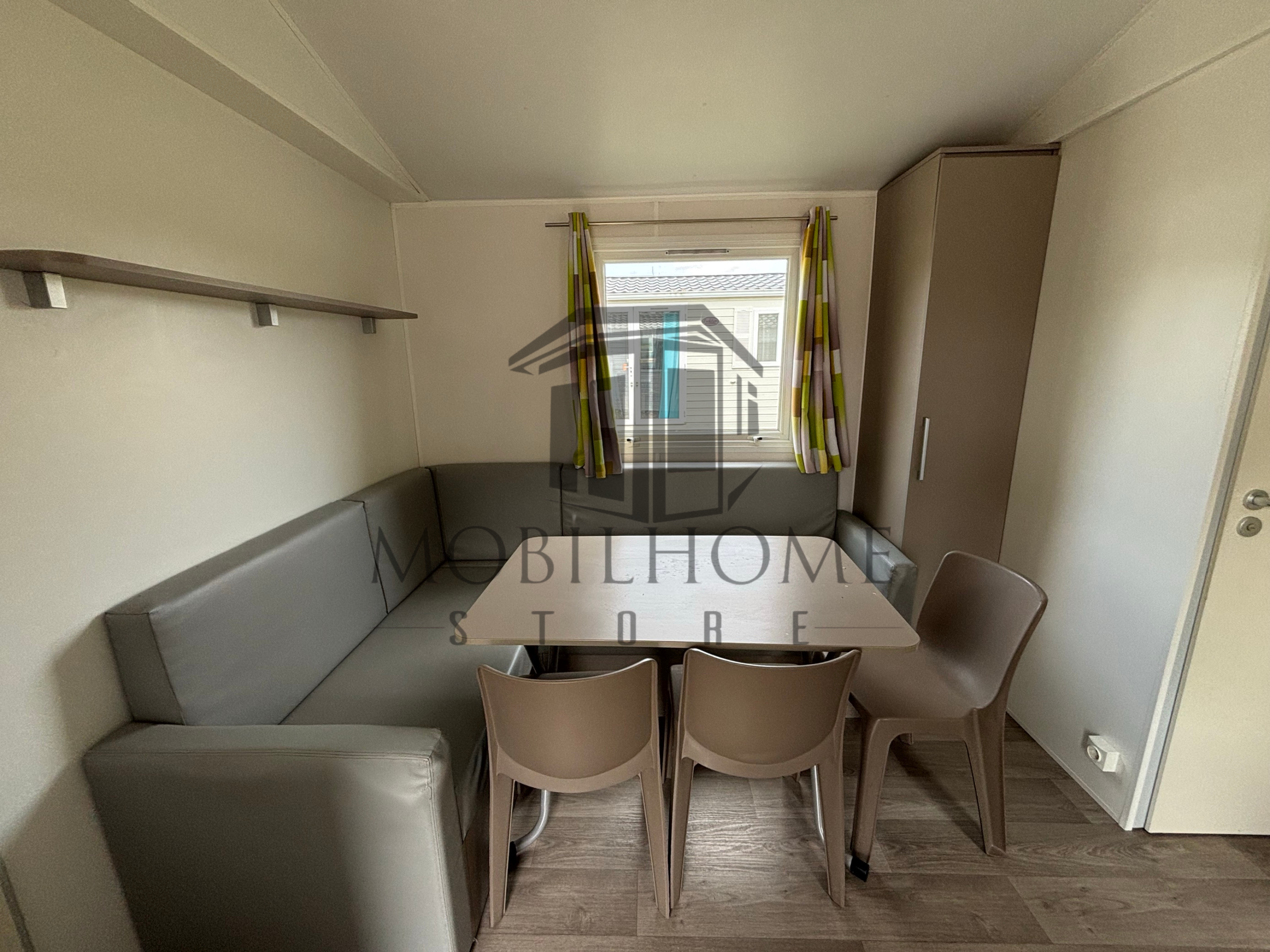 Coin repas du mobil-home TRIGANO EVO 33